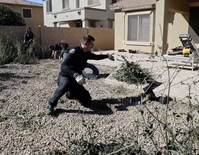 Chandler Police Officers Help Elderly Resident with Yard Cleanup